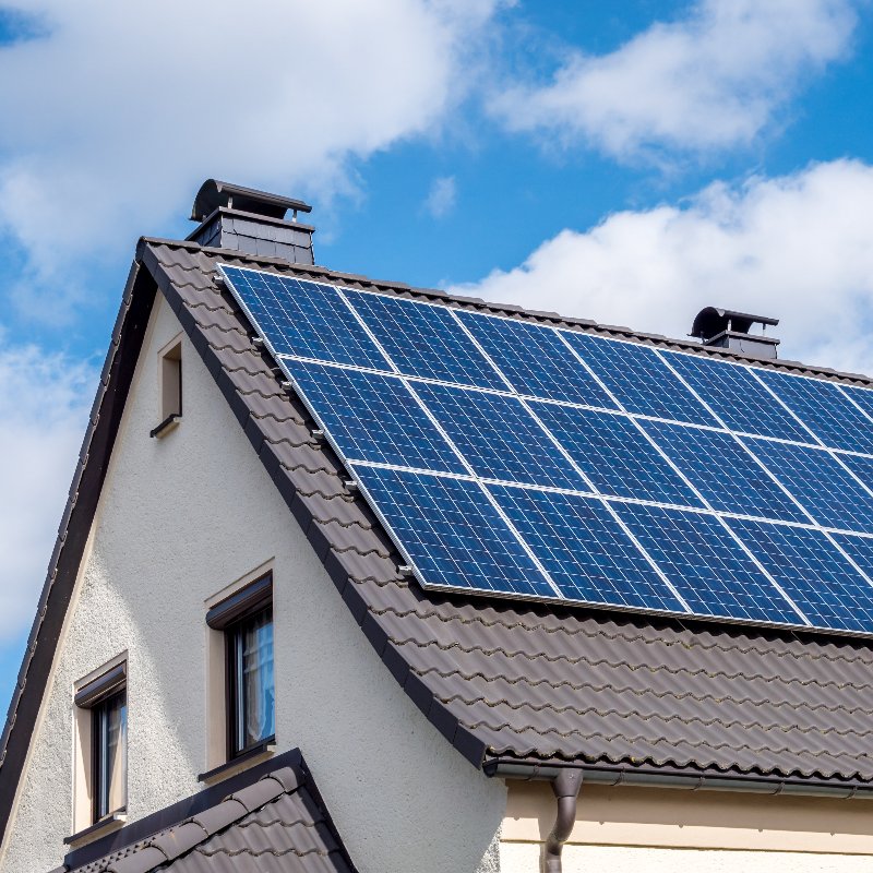 home with solar panels on the roof