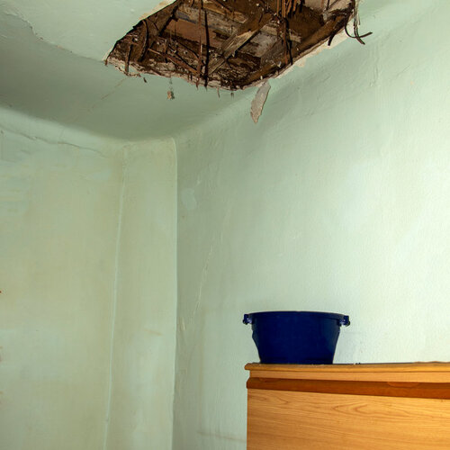 large hole in a home's ceiling