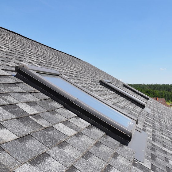 Shingles asphalt roofing with skylights