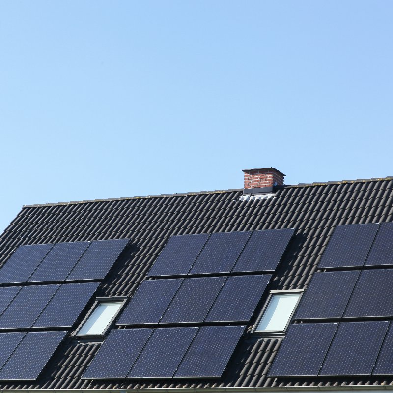 solar panels on top of a tile roof