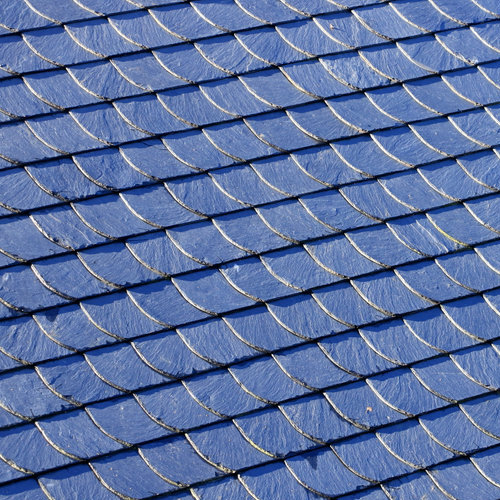 Close-up of deep gray slate roof shingles.